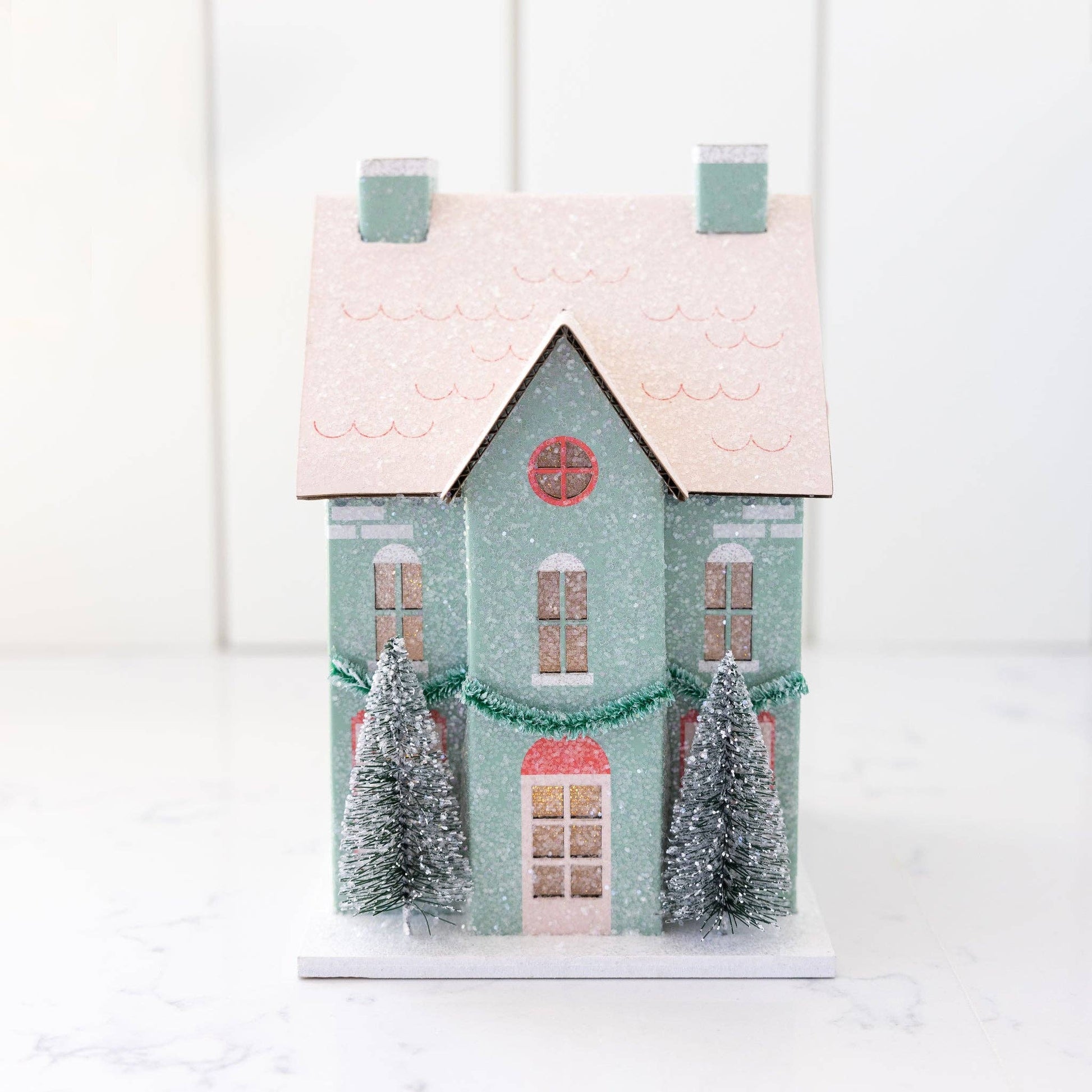 Cozy Christmas house decoration with battery-powered light, perfect for holiday tablescape, 4.5” x 6” size.