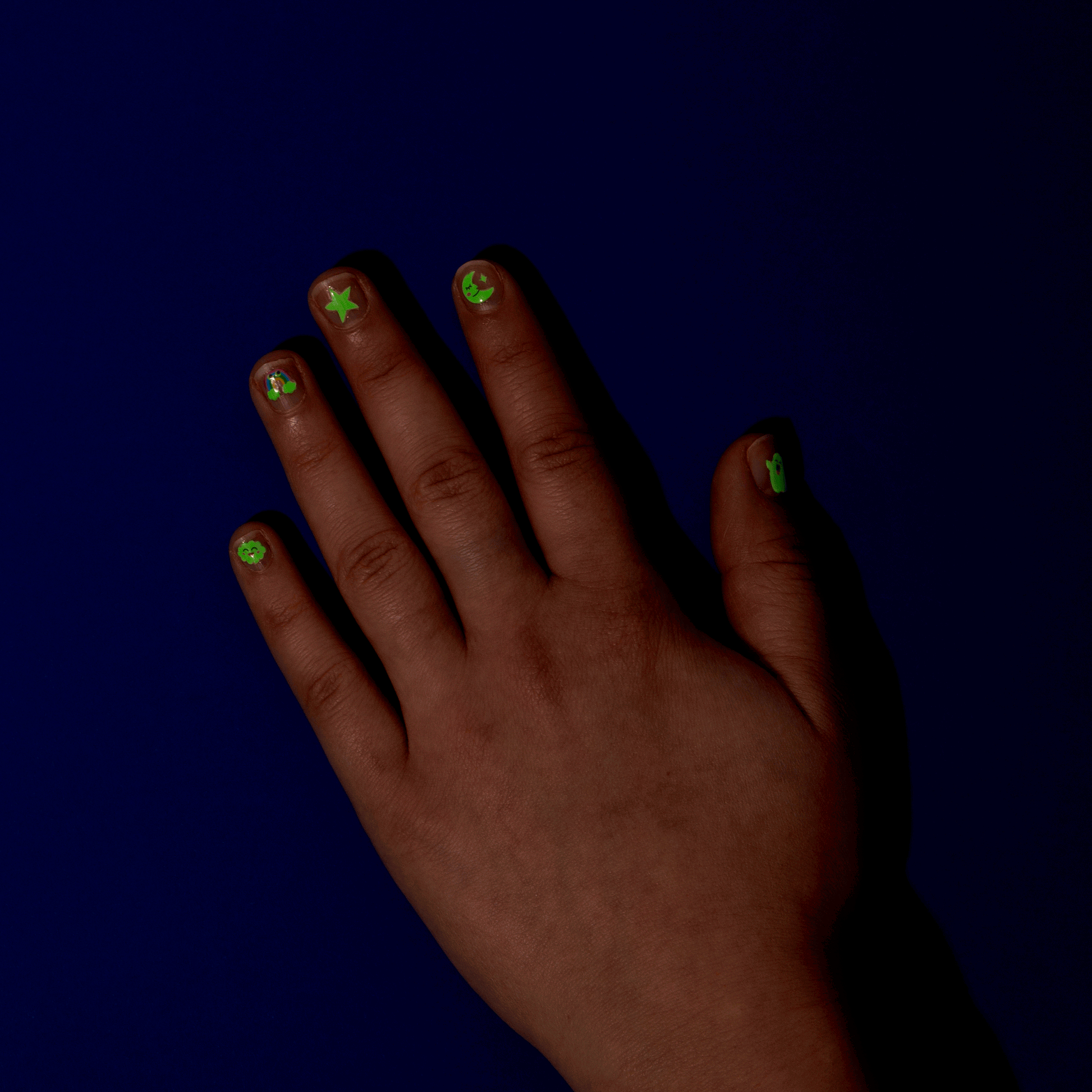 Glow in the dark nail stickers for kids, featuring 200 easy-to-use stickers that light up in the dark and fit comfortably on hands of all shapes and sizes, suitable for ages 3 and up.