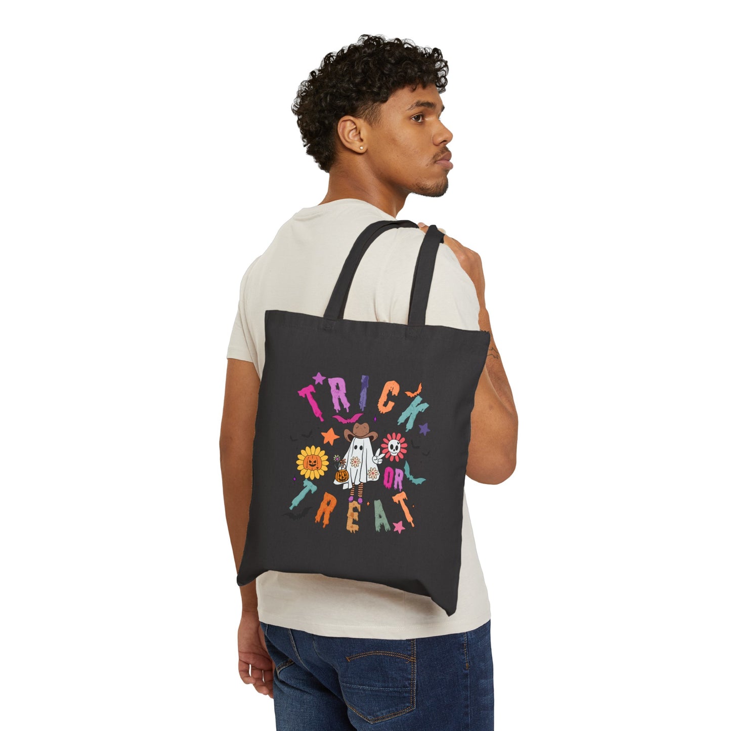Halloween Cowboy Ghost Trick or Treating bag made from durable natural canvas, featuring a colorful ghost design. This 15" x 16" tote with 20" handles is perfect for kids, teachers, and Halloween lovers to collect candy, carry books, or use as a festive fall bag.