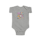 Trendy Cowboy Ghost Trick or Treat baby onesie featuring a cute ghost in a cowboy outfit holding a candy bag. Made from 100% combed ringspun cotton, this short-sleeved bodysuit is comfortable, lightweight, and perfect for baby boys or girls aged 6M-24M.