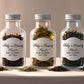 Let Love Brew tea favors – premium tea in acrylic bottles with custom tags for weddings and events.