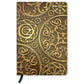 Notebook with intricate gold mechanical design on a white background