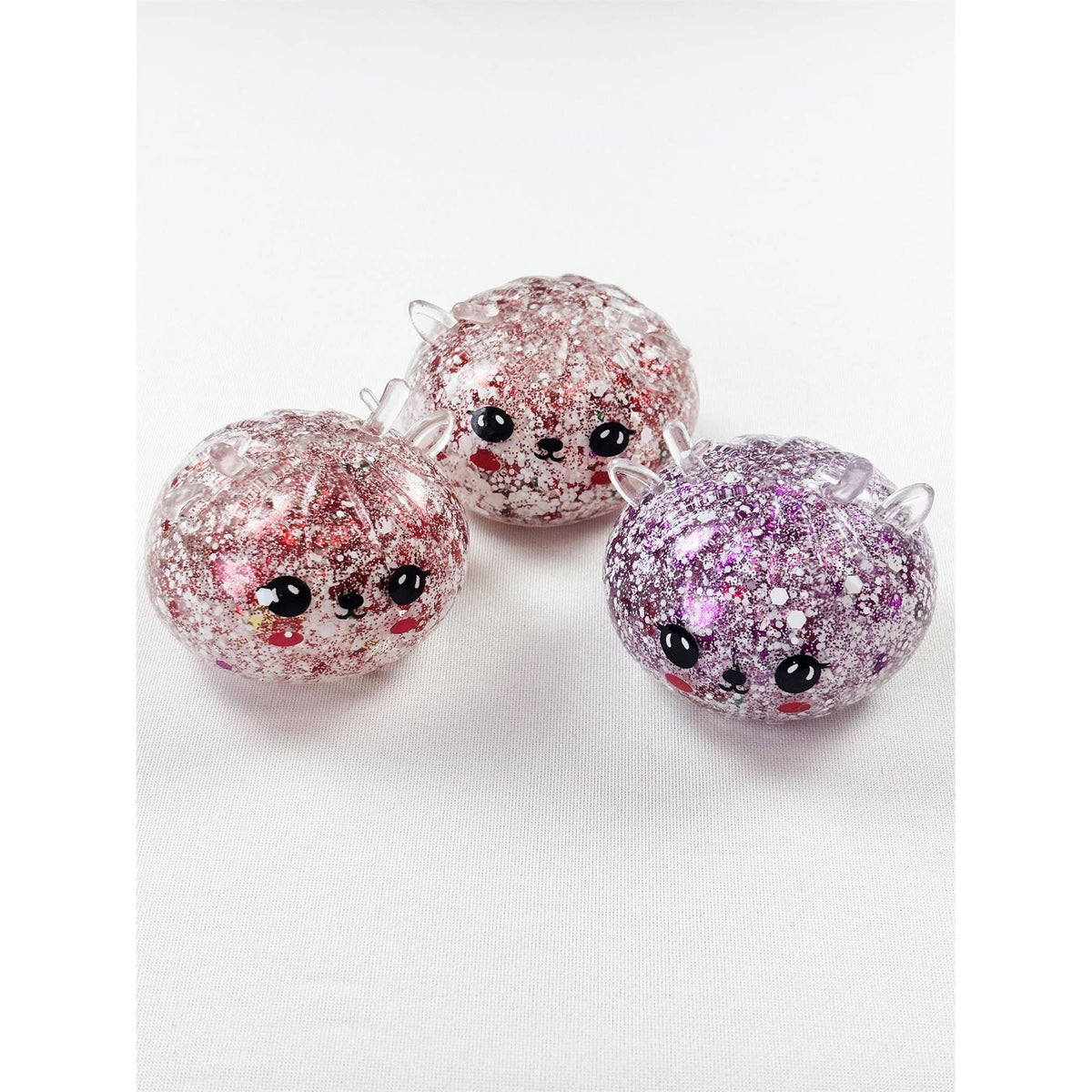 "Holiday Dim Sum" 🥟 Christmas Glitter Dumpling Squishy Toys (12 Steamers) by Love and Repeat