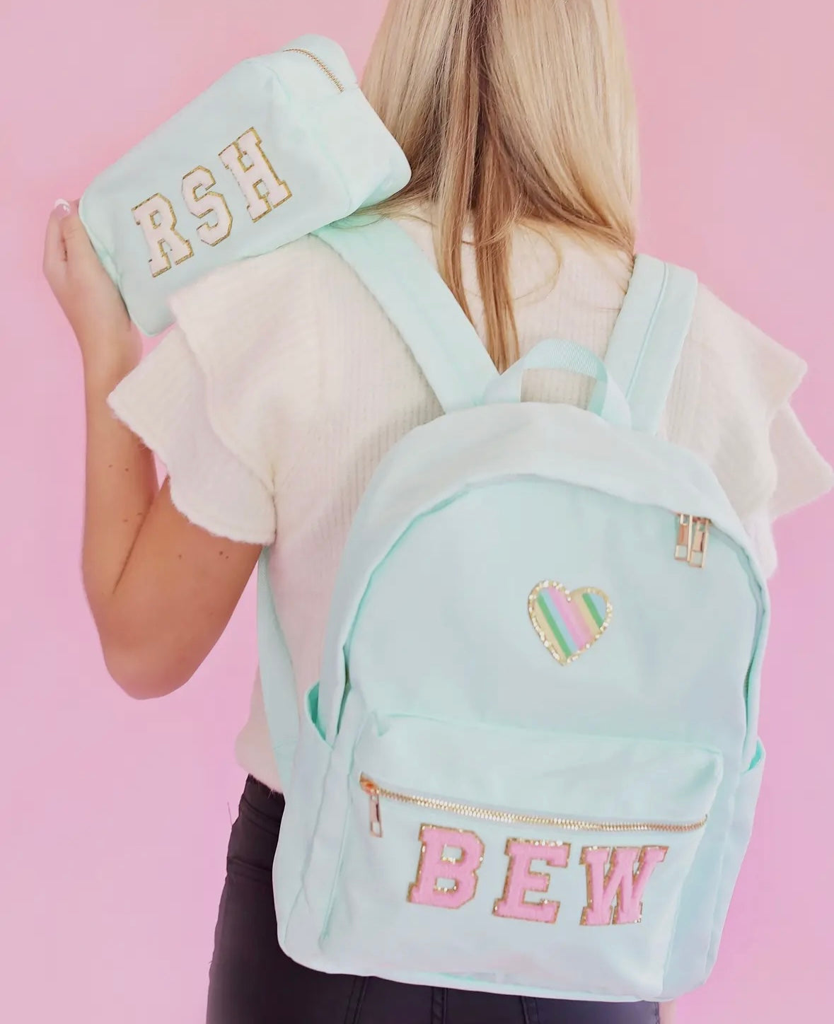 Solid backpack perfect for school, gym, or travel. Features easy clean lining and a spot clean exterior. Dimensions are 16" x 11" x 5", making it ideal for students and everyday use. Durable and versatile for multiple occasions.
