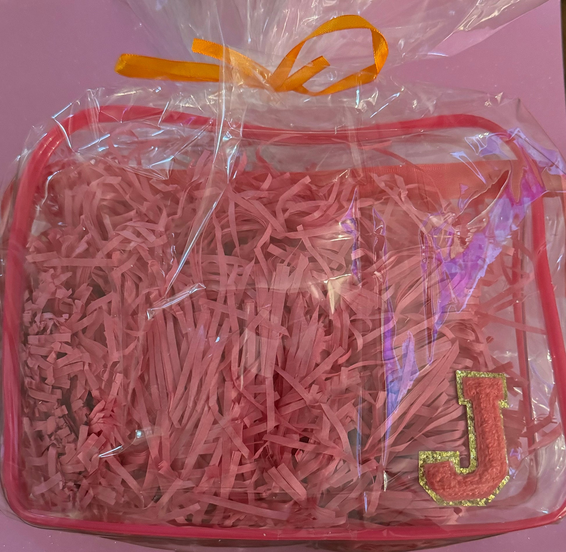 Personalized "All that Glitters" skincare pouch, perfect for storing skincare essentials. The pouch is customized with a name and favorite icons, making it an ideal party favor for pampering yourself or gifting to friends.