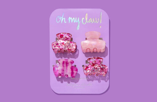 Set of 4 mini hair clips, each measuring 1.25 inches, ideal for stylish half-up hairstyles or adding a cute touch to any outfit. Includes 2 pink confetti clips and 2 pink acetate acid clips, presented on a 3.5" x 6.25" backer card with a gold ric rac ribbon hanger.
