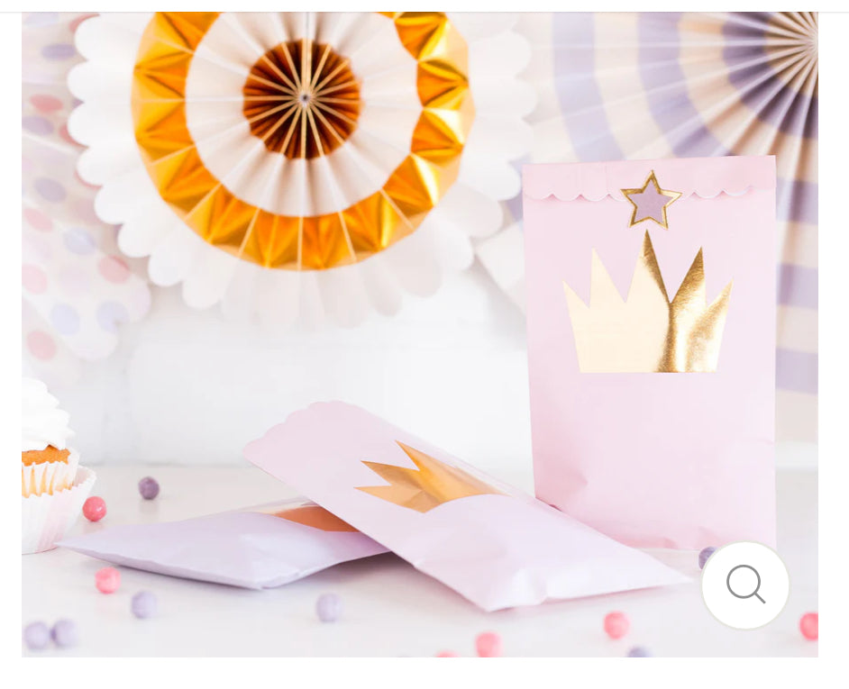 Princess-themed paper treat bags in blush, pale pink, and lavender, each featuring a gold-foiled crown. Includes 24 bags with 24 gold-accented star sticker seals. Perfect for princess parties, ladies night out, or bunco party favors. Excitement guaranteed!"