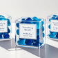 Personalized candy box filled with M&Ms, Kisses, or gummy bears for party favors.