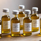 Gourmet olive oil favors – custom labels, premium cold-pressed oil for weddings and engagements.