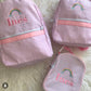 Pretty in Pink pink seersucker small backpack for toddlers & fashionistas. Fits iPad, makeup, credit cards. Washable.