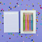 Set of 5 colorful "Best Teacher Ever" pens with matching ink colors. Medium ballpoint pens in a white gift box with gold foil dots, perfect for teacher appreciation gifts.