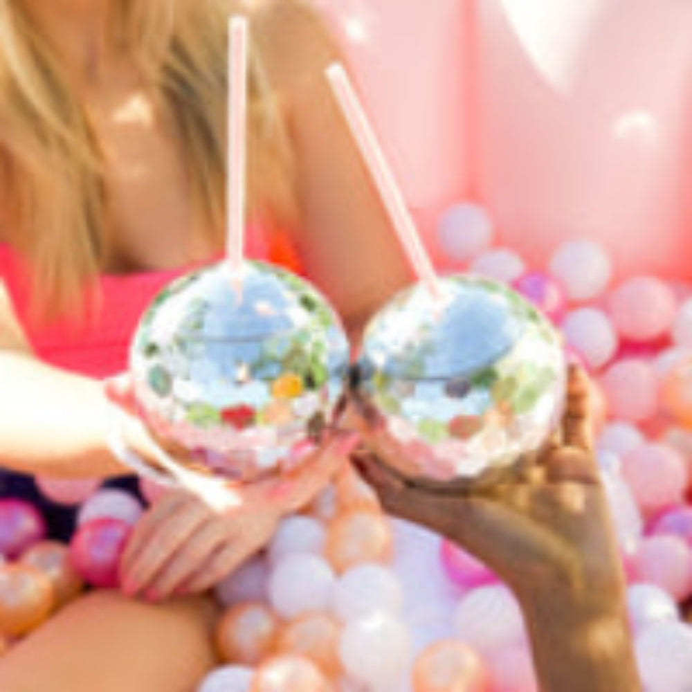 Packed Party Disco Drink™ 20 oz tumbler with spill-proof stopper, for hot or cold drinks, BPA-free.