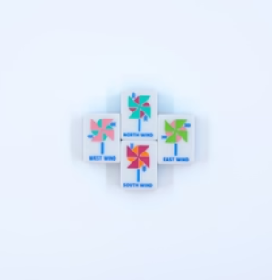 Close-up of Prism Blue Mahjong tiles on table