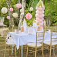 Princess castle party plates with detailed gold accents and soft pink hues.