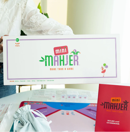 Family playing Mini Mahjer Mahjong board game