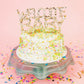 Set of 4 "Welcome Baby" cake toppers with confetti and sparkle, perfect for baby showers.