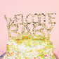 "Welcome Baby" acrylic cake toppers with silver hologram foil, great for baby shower cakes.