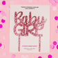 Set of 4 "Baby Girl" cake toppers in hot pink foil, perfect for baby showers and gender reveals.