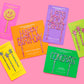 Set of 4 pink confetti stars cake toppers with gold foil, ideal for celebrations and cakes.