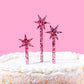 Reusable pink confetti stars cake toppers with gold foil, perfect for birthdays and baby showers.