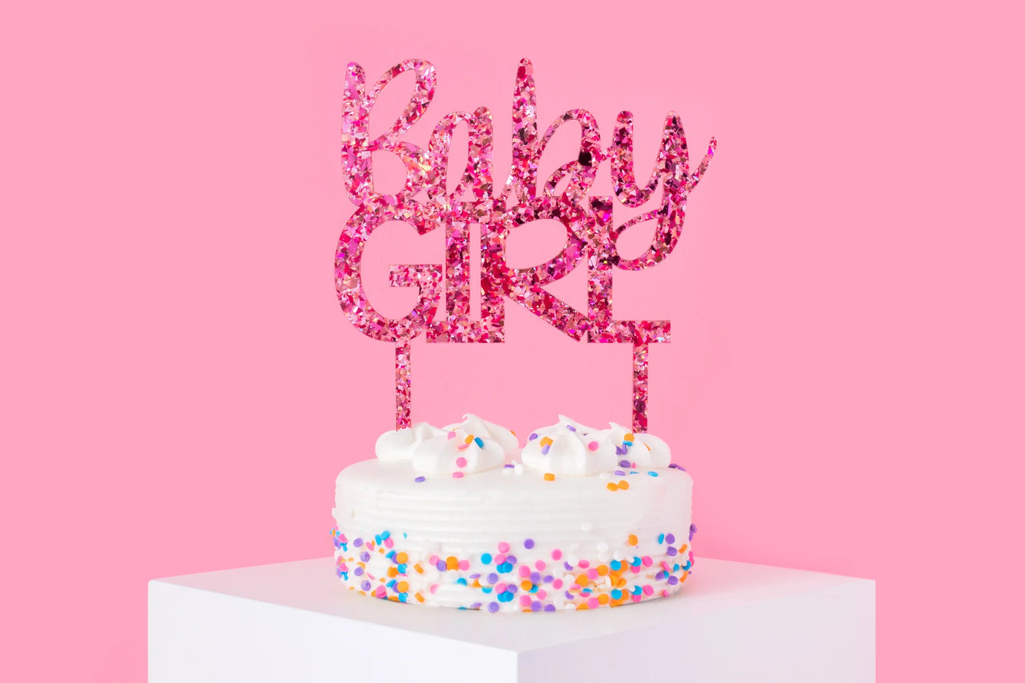 Handmade "Baby Girl" cake toppers with hot pink foil, perfect for cakes, cupcakes, and donuts.