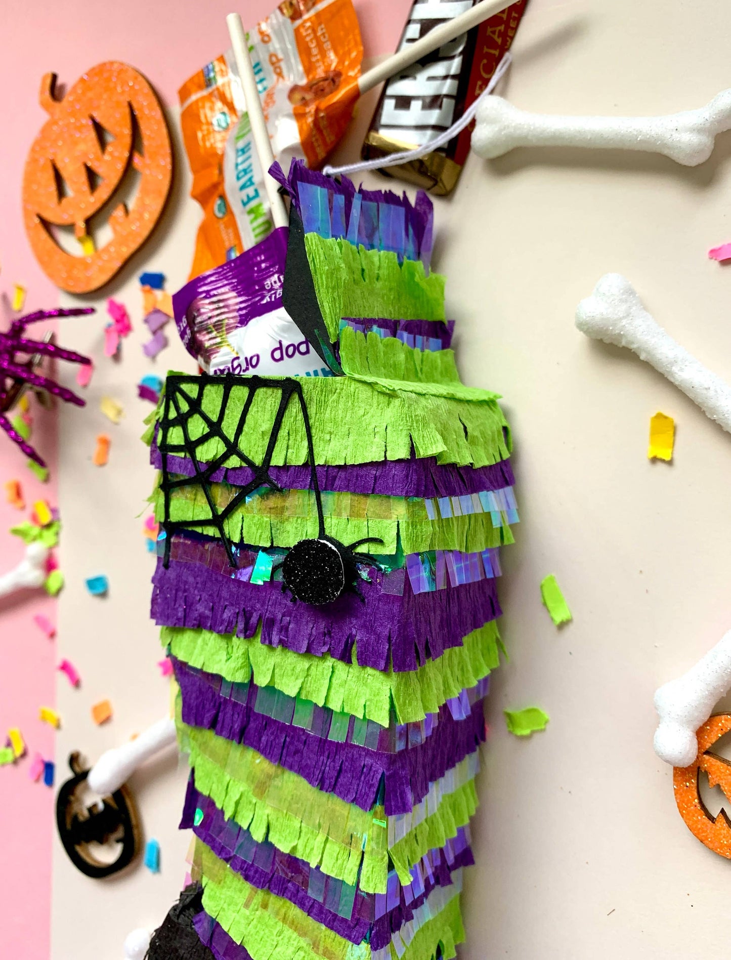 Halloween Witch Leg Mini Piñata, Ideal for Halloween Decorations and Party Favors, Measures 7 inches Tall, 3 inches Long, and 1.5 inches Wide, Features Trap Door for Treats.