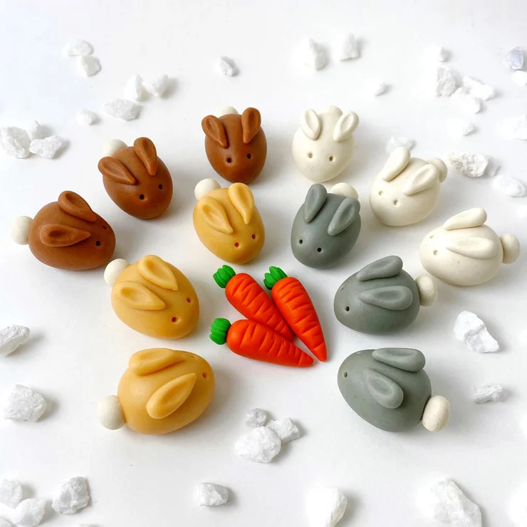 Soft pastel Easter bunnies and bonus mini carrots in a gift box, perfect for Easter baskets.
