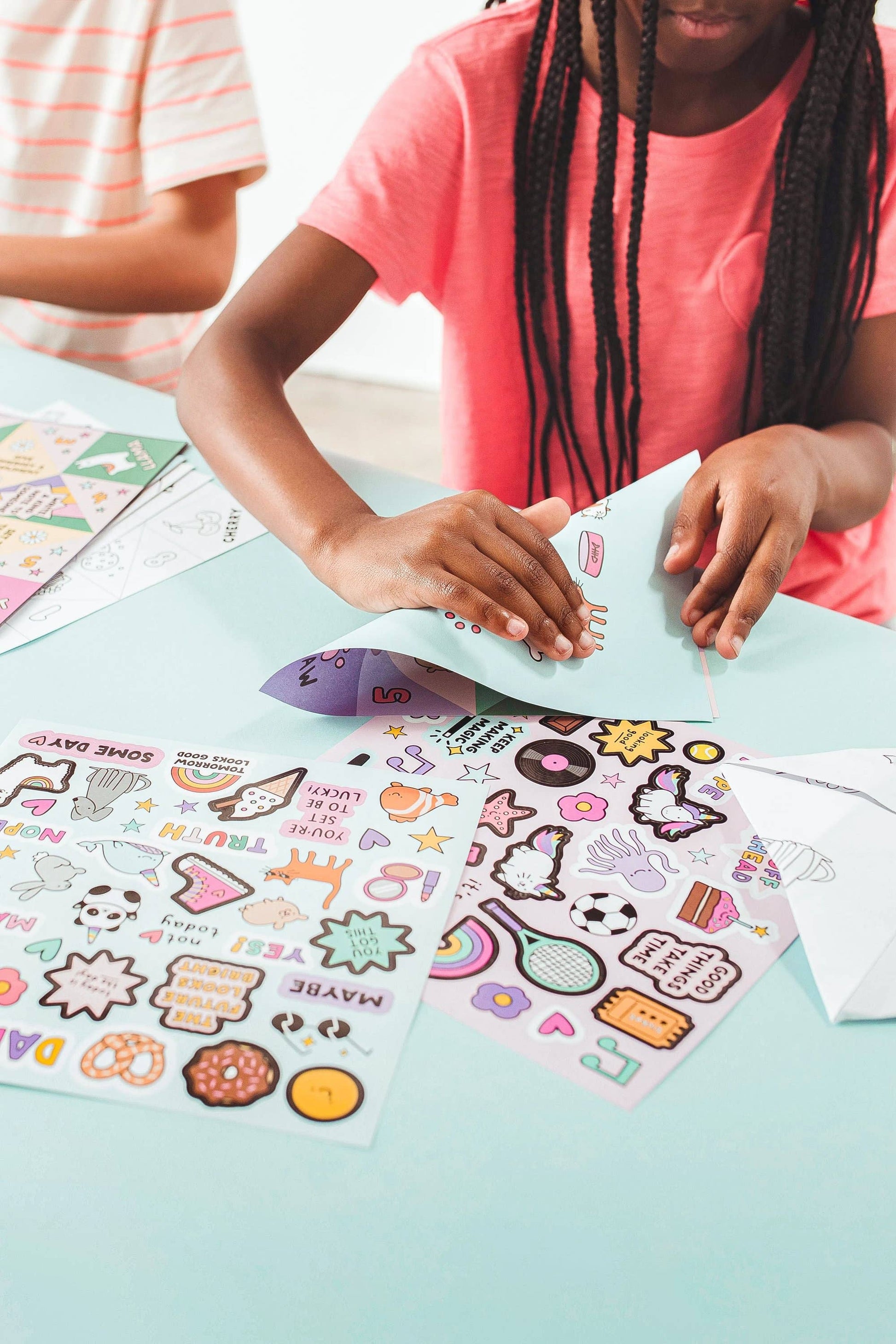 DIY Paper Fortune Teller Kit for Kids with 24 Foldable Sheets, Including Ready-to-Fold, Color-In, and Create-Your-Own Designs, Plus 2 Sticker Sheets for Customization, Perfect for Playdates and Sleepovers.