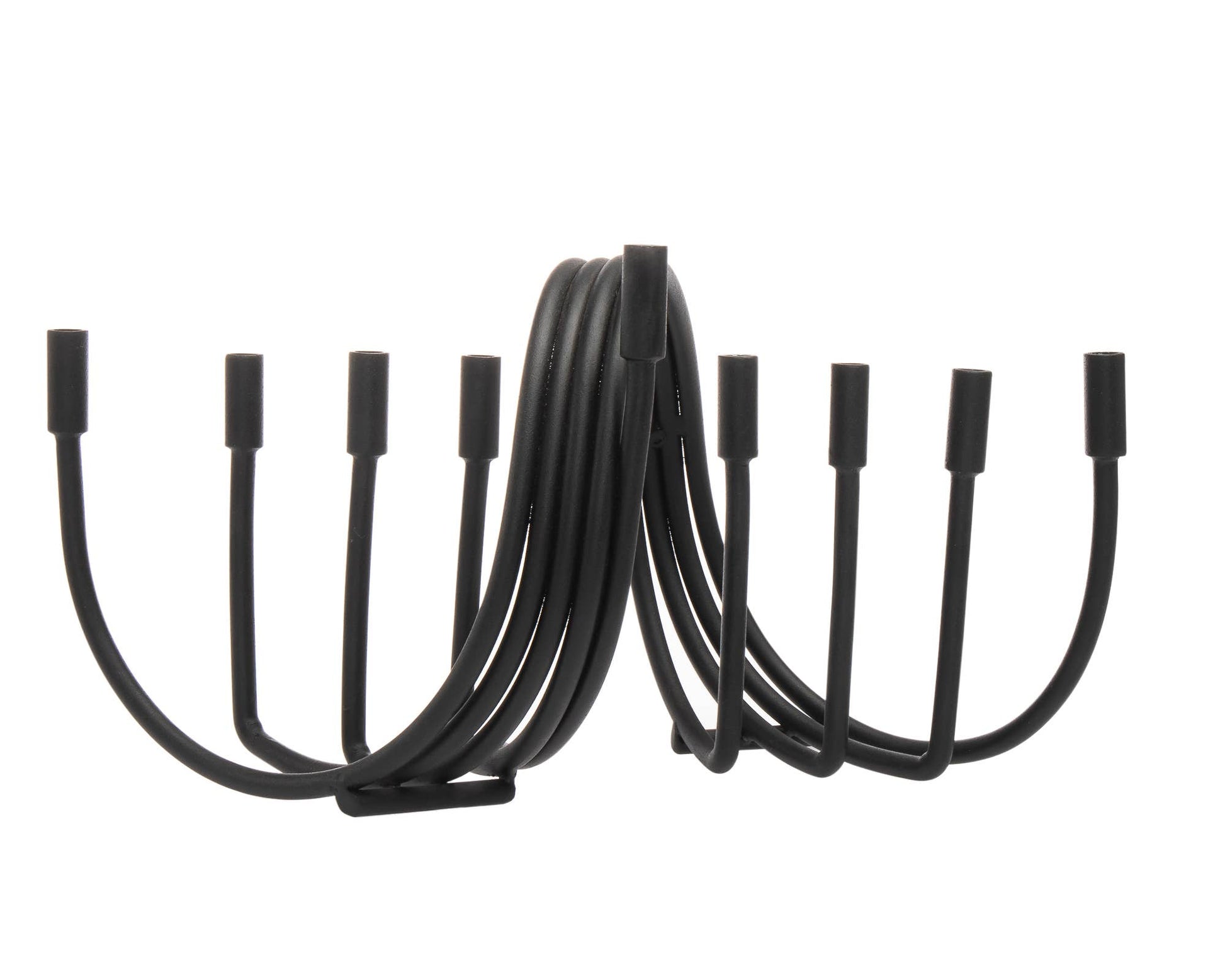 Elegant Godinger Black Swirl Menorah, crafted in India from alternative metal. Features an intricate black swirl design, measuring 12" x 6" x 6" H. A stylish and sophisticated addition to any space, ideal for Chanukah celebrations or as a unique decorative piece."