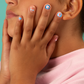 Lily the Unicorn nail stickers for kids, featuring 200 easy-to-use stickers that fit hands of all sizes. Durable for 1-2 days and hand-wash safe, perfect for imaginative play and unicorn-themed parties. Fun nail art set for kids, packaged in a 28 x 11 cm envelope.