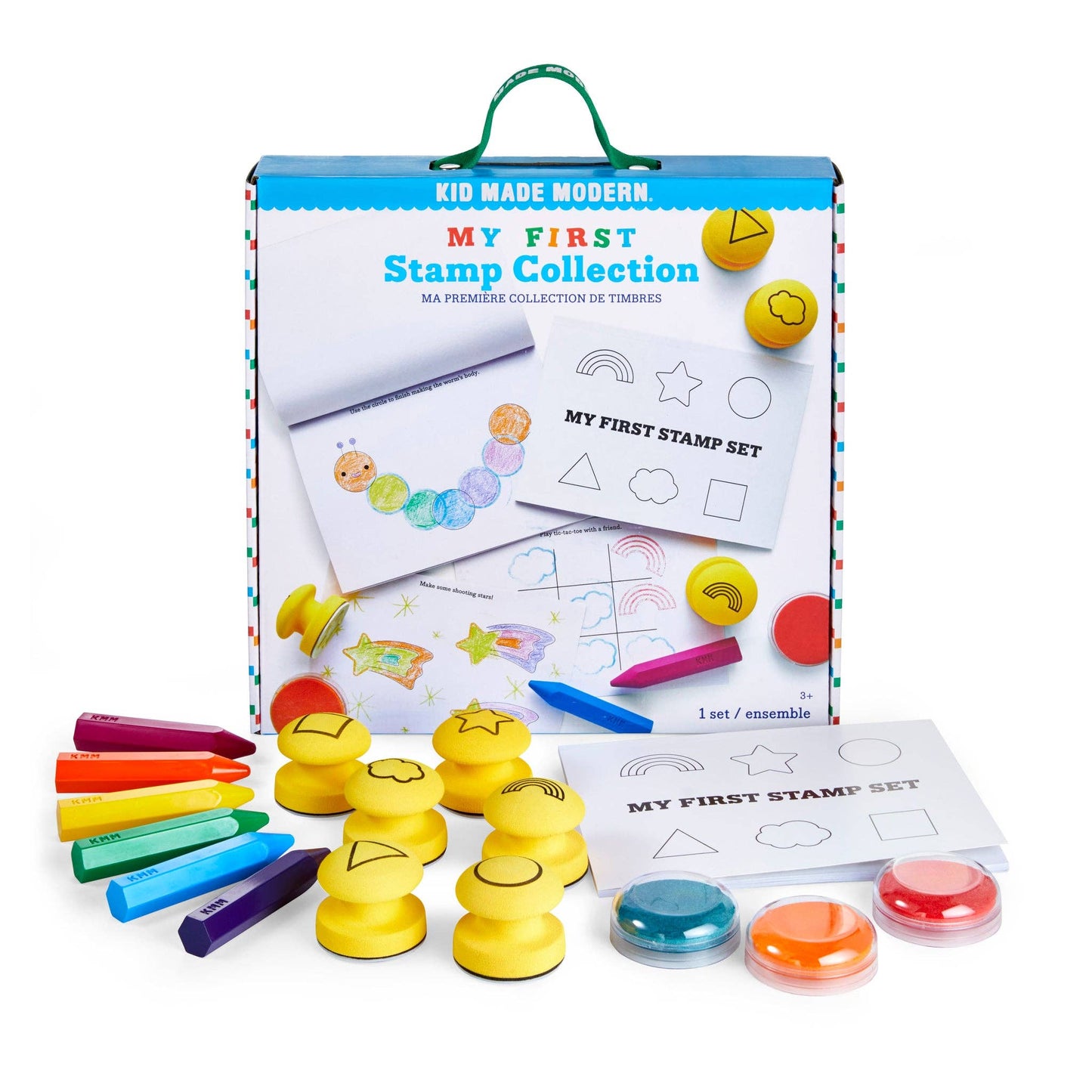 Toddler using large colorful stamps on paper