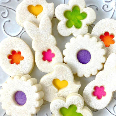Easter-themed marzipan linzer cookies with spring colors and festive designs for your holiday treat.