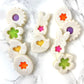 Marzipan Easter linzer cookies decorated with spring colors, perfect for your Easter celebration.
