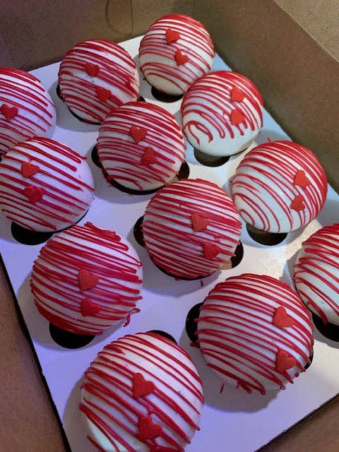 Hot cocoa bombs with mini marshmallows in Valentine packaging