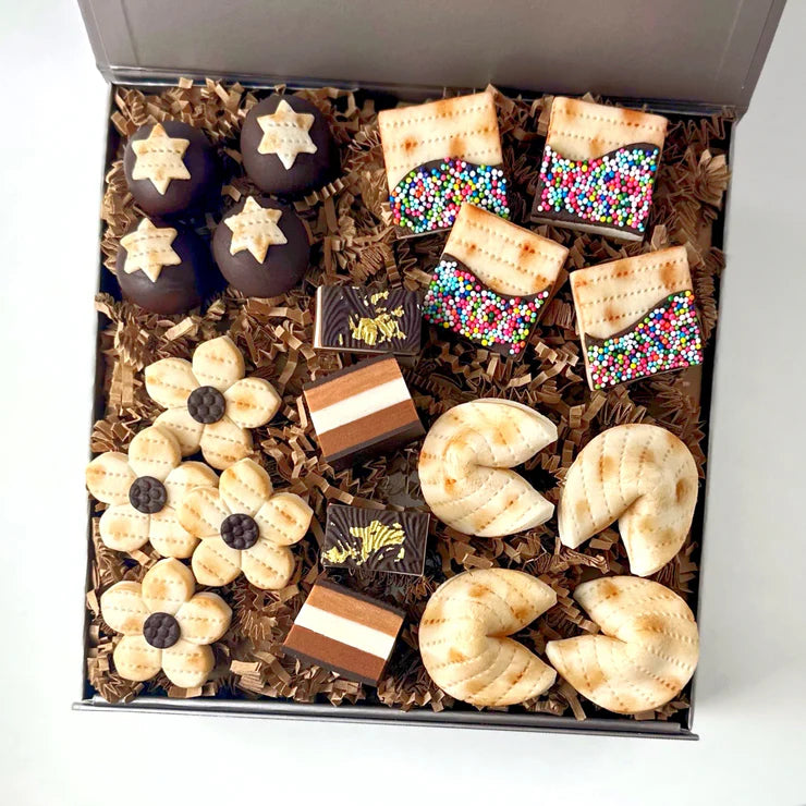 Elegant Passover gift basket with 20 marzipan treats – includes truffles, cookies, and more.