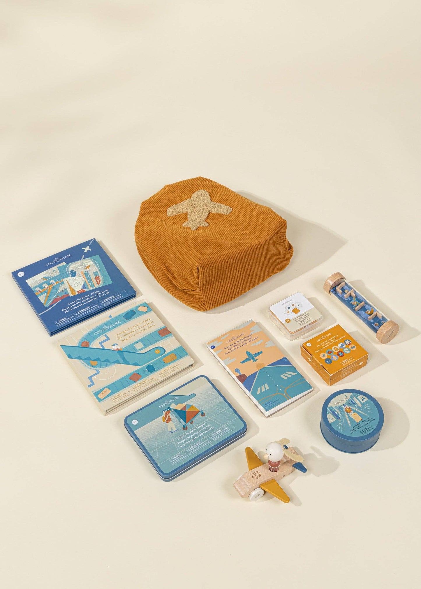 Aviation-themed playset with games, puzzles, stickers, and cards