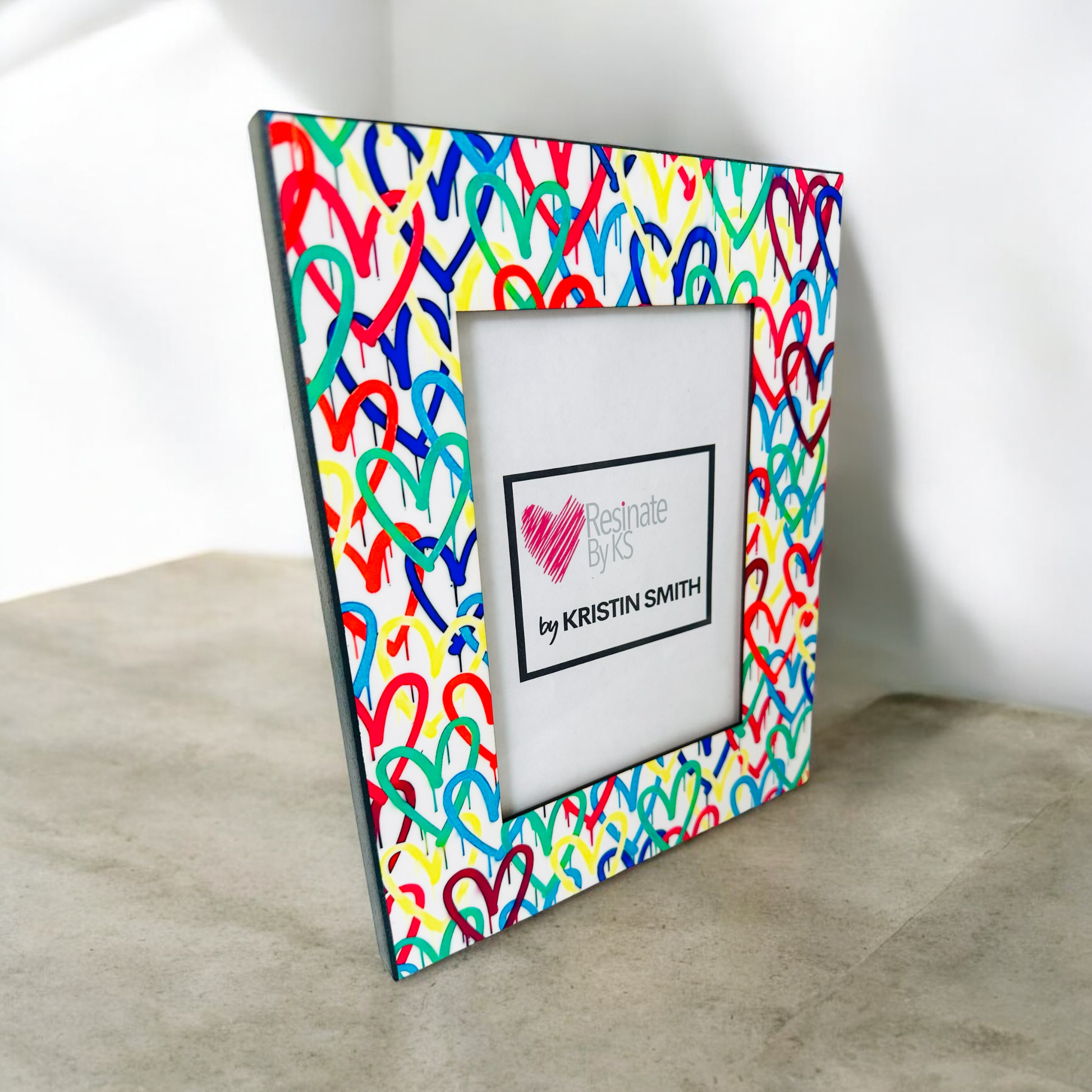 Floating hearts picture frame 8x10, holds 5x7 photo, romantic resin design for cherished memories.