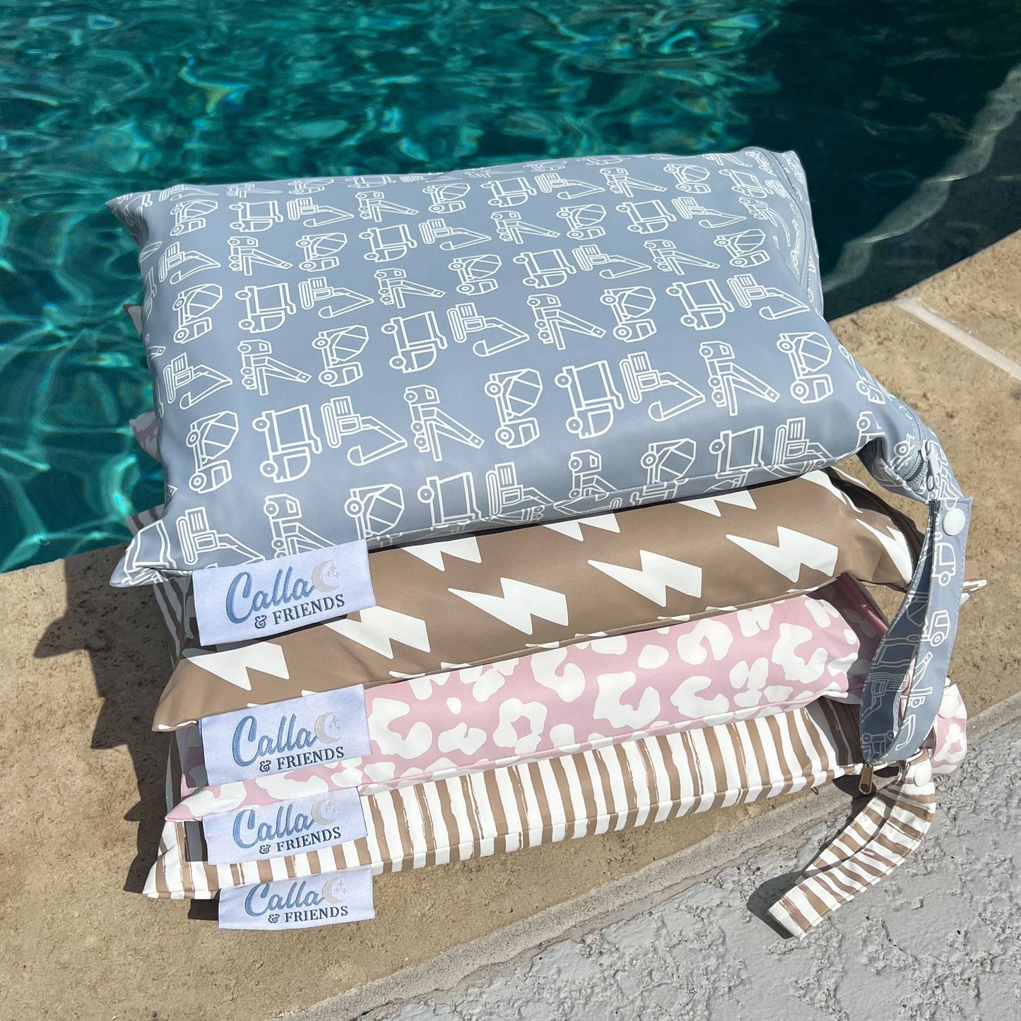 Beach setup with kids’ Kenzie towel and accessories