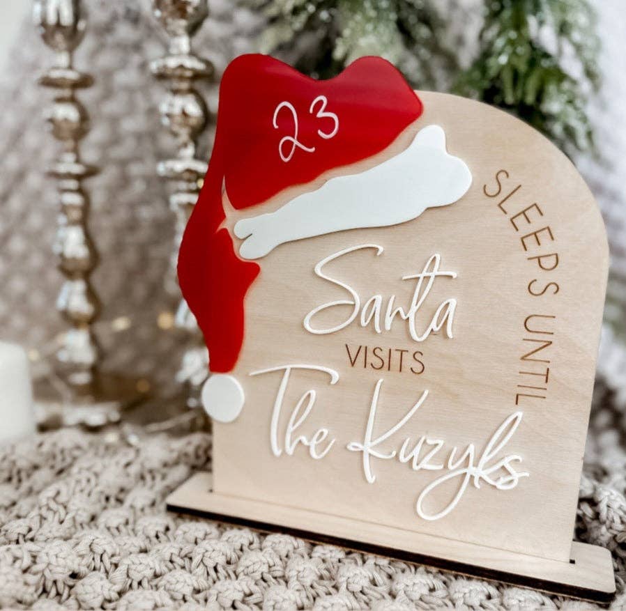 Personalized Santa Claus wooden sign for Christmas decor, crafted from high-quality wood with intricate engraving. Customizable with a family name or special message, perfect for gifting or adding festive charm to your home. A timeless holiday keepsake.