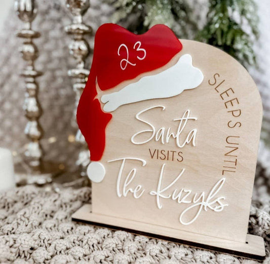 Personalized Santa Claus wooden sign for Christmas decor, crafted from high-quality wood with intricate engraving. Customizable with a family name or special message, perfect for gifting or adding festive charm to your home. A timeless holiday keepsake.