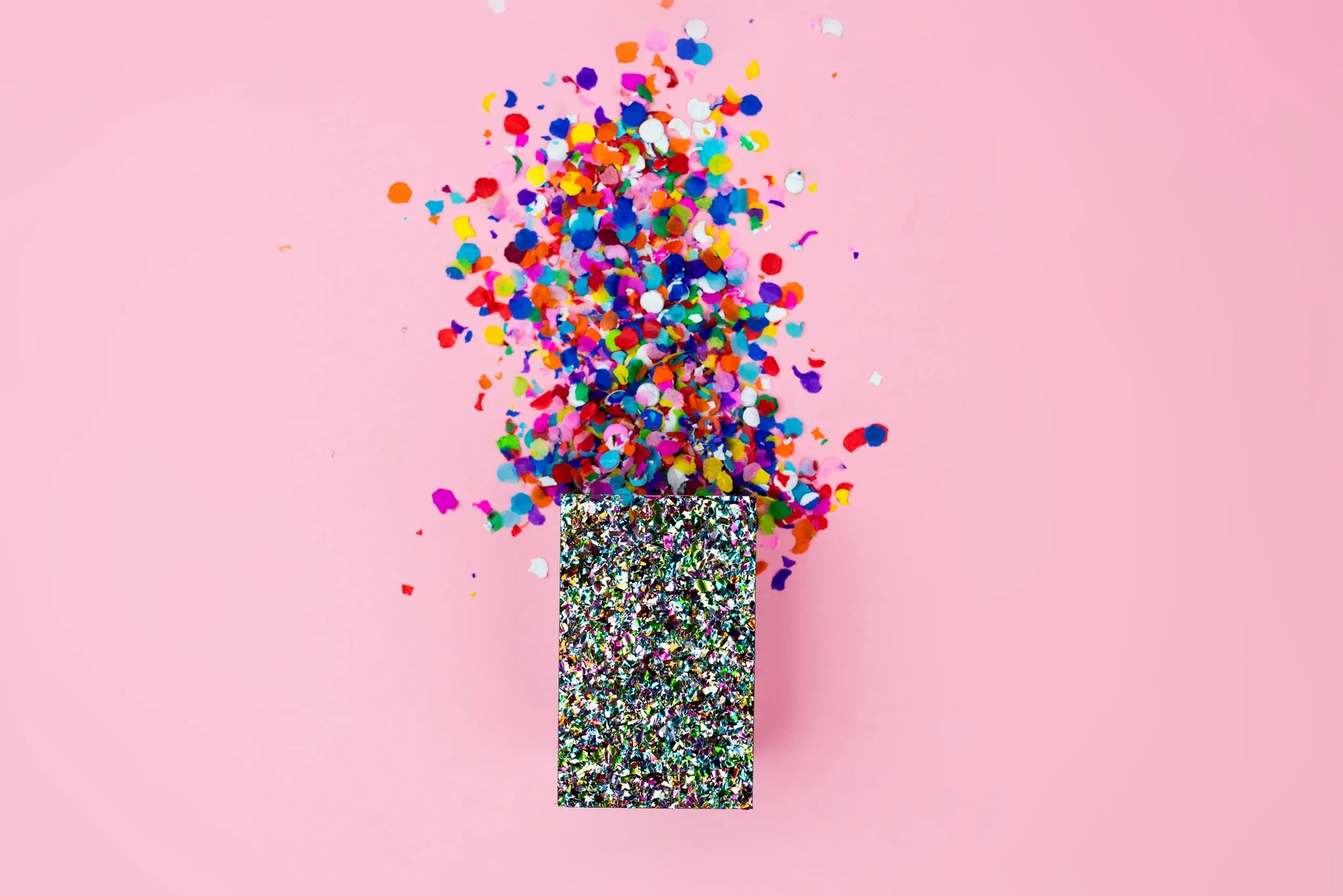 Set of 4 acrylic pen cups with hand-sprinkled confetti, stylish and fun for any workspace.