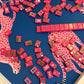 Flirty Leopards Mahjong mat with pink stitched border