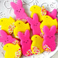 Fun and festive marzipan chicks and bunnies with sprinkles, ideal for Easter table settings.