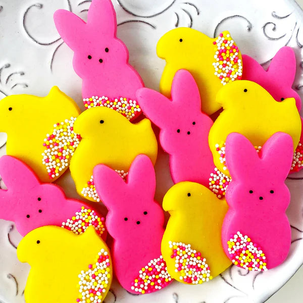 Fun and festive marzipan chicks and bunnies with sprinkles, ideal for Easter table settings.