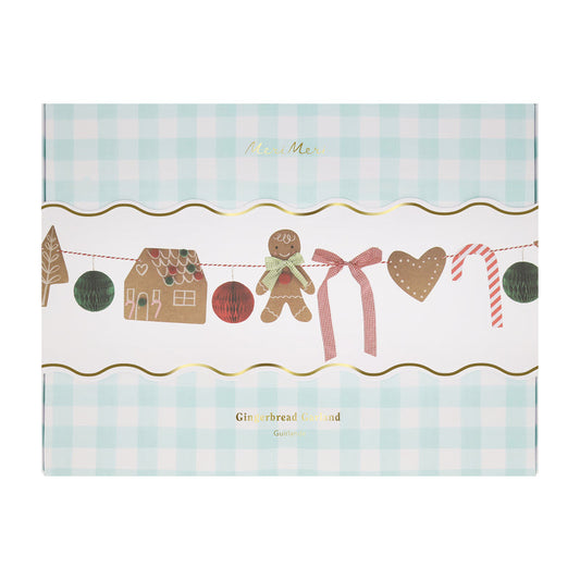 Charming gingerbread garland with candy canes, honeycomb balls, gingham bows, and festive pom-pom details.