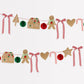 Charming gingerbread garland with candy canes, honeycomb balls, gingham bows, and festive pom-pom details.