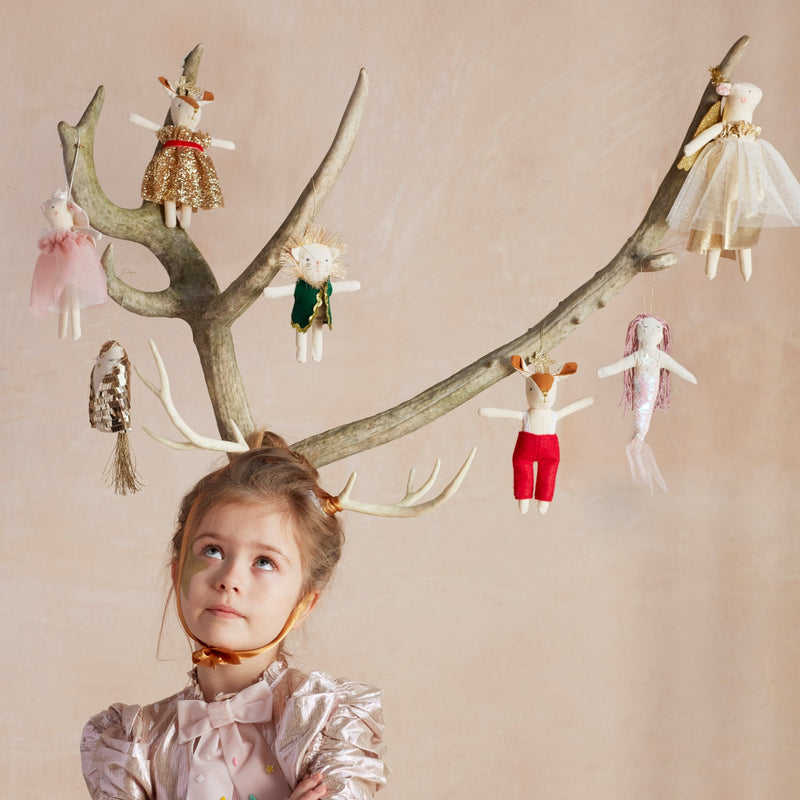 Charming angel mouse tree topper with a taffeta gold dress, glitter wings, and a shimmering halo for a festive holiday touch.