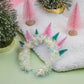 Colorful Christmas Tree Holiday Headband with glitter, felt trees, and tinsel. Festive, one-size-fits-most head bopper for holiday parties and celebrations.