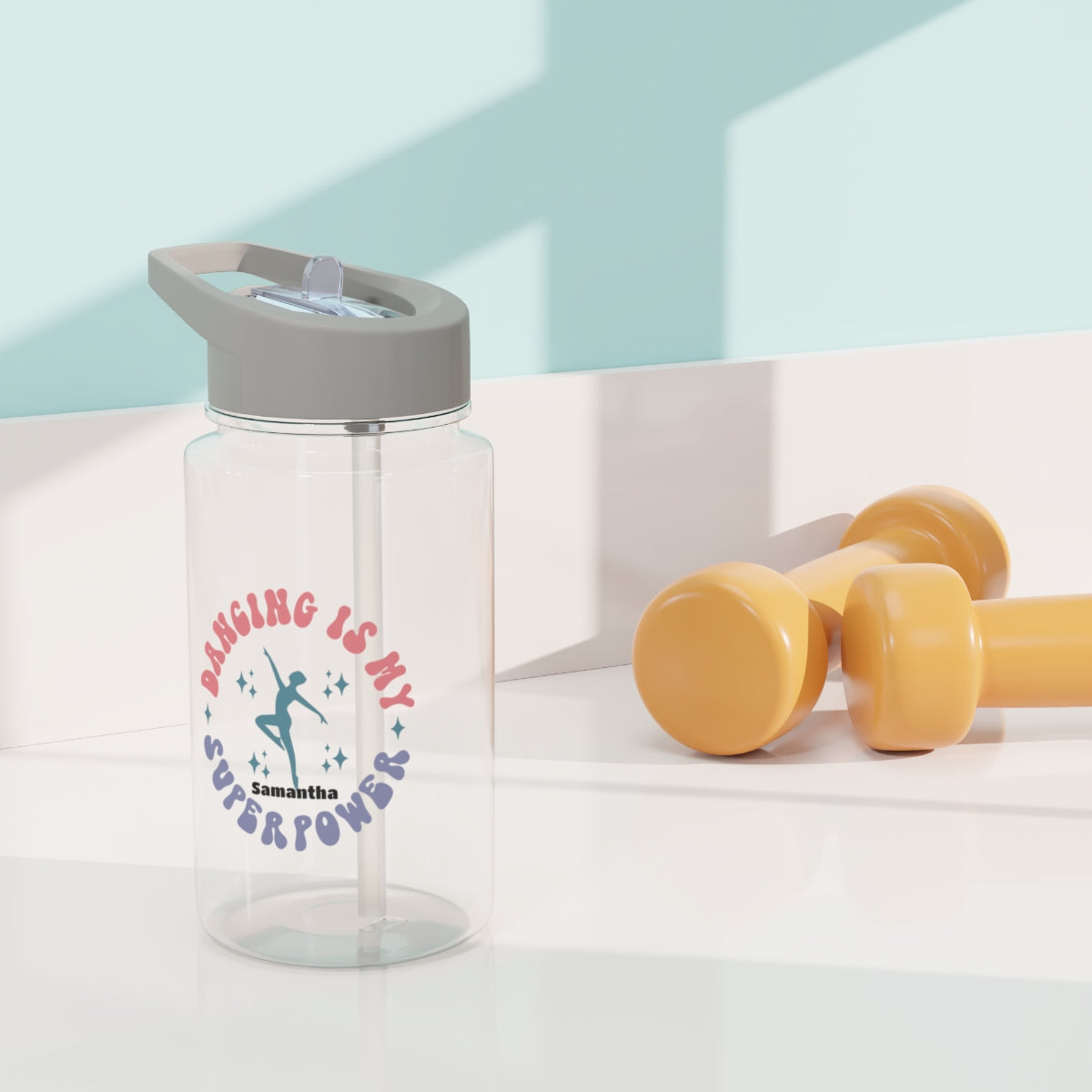 Personalized Tritan water bottle with 'Dancing is my Superpower' design, featuring a biodegradable construction and available in two sizes. Equipped with a grey spill-resistant lid and clear mouthpiece, this BPA-free bottle is perfect for dance parties and eco-conscious hydration.