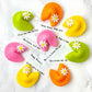 Marzipan Easter fortune cookies with fun fortunes and daisy decoration in a festive gift box.